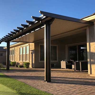 Patio cover over a small and open outdoor space in a backyard